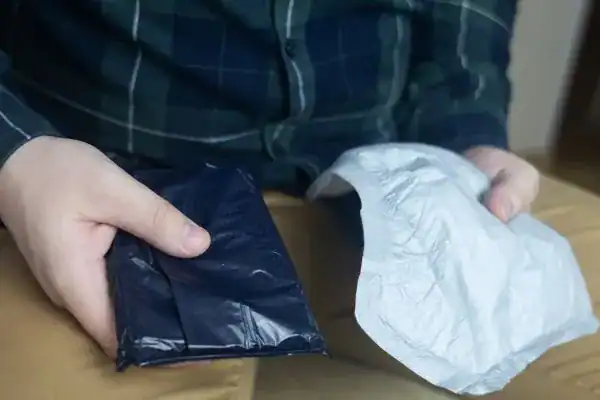 image of man holding stool incontinence Canterbury products